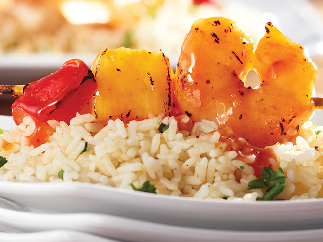 Dorothy Lynch Grilled Shrimp & Pepper Skewer on a bed of rice