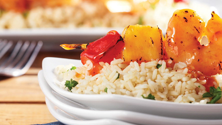 Dorothy Lynch Grilled Shrimp & Pepper Skewer on a bed of rice