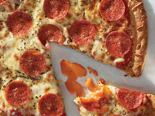 Dottie Lynch’s Home Style Pizza on parchment paper