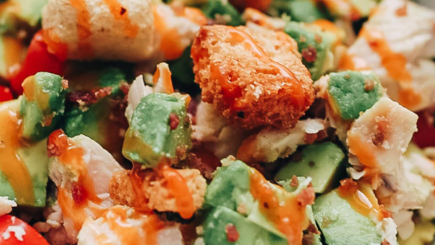 Avocado Chicken Salad with a drizzle of Dorothy Lynch
