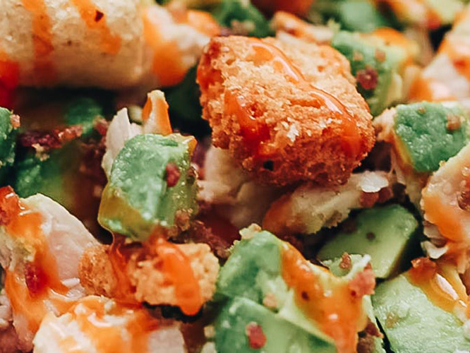 Avocado Chicken Salad with a drizzle of Dorothy Lynch