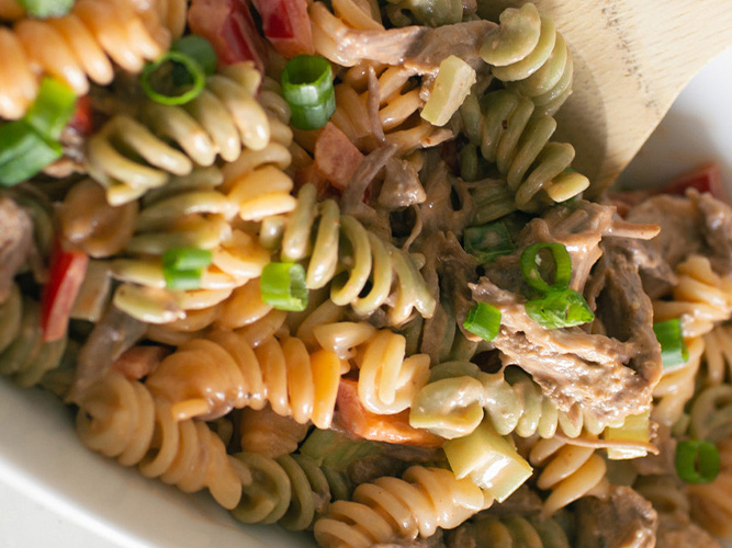 Dorothy Lynch Pulled Pork Pasta Salad in a white serving bowl
