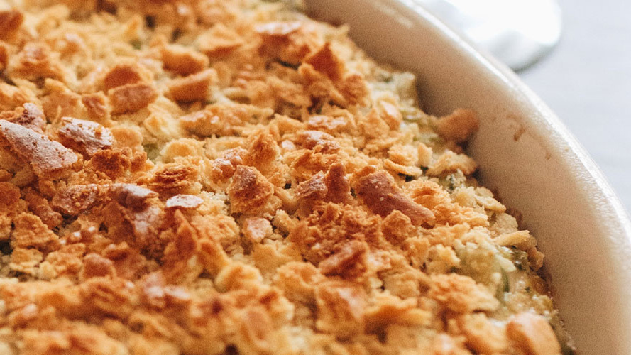 Broccoli Casserole in a white casserole pan