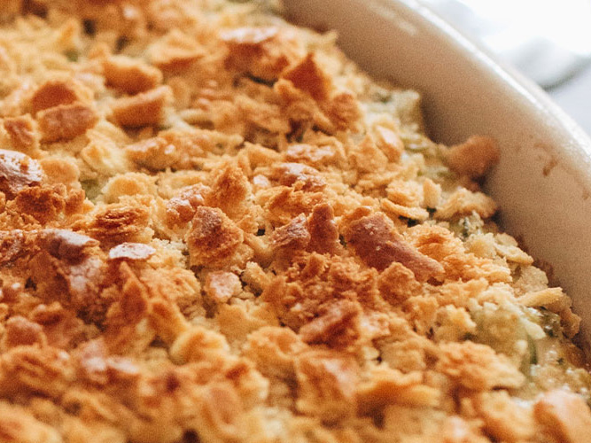 Broccoli Casserole in a white casserole pan