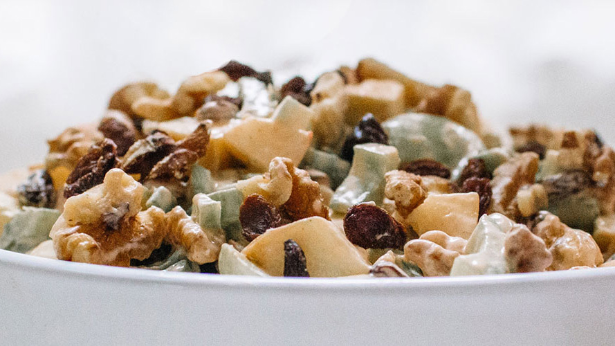 Fruit and nut salad generally made of celery, fresh apples, walnuts, and grapes, dressed in mayonnaise and with Dorothy Lynch