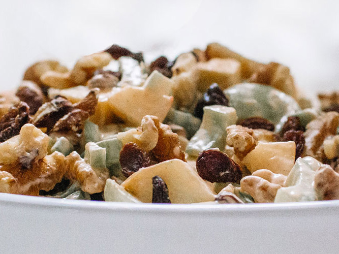 Fruit and nut salad generally made of celery, fresh apples, walnuts, and grapes, dressed in mayonnaise and with Dorothy Lynch