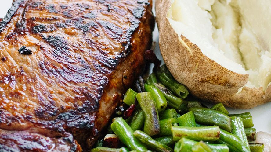 Dorothy Lynch Spicy Steak Sauce Recipe with green beans and a baked potato