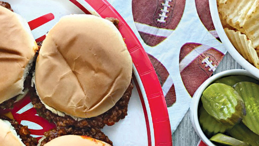 Dorothy Lynch Sloppy Sandwich Recipe on a paper plate at a tailgate