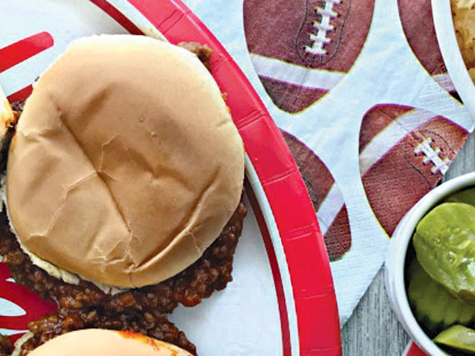 Dorothy Lynch Sloppy Sandwich Recipe on a paper plate at a tailgate