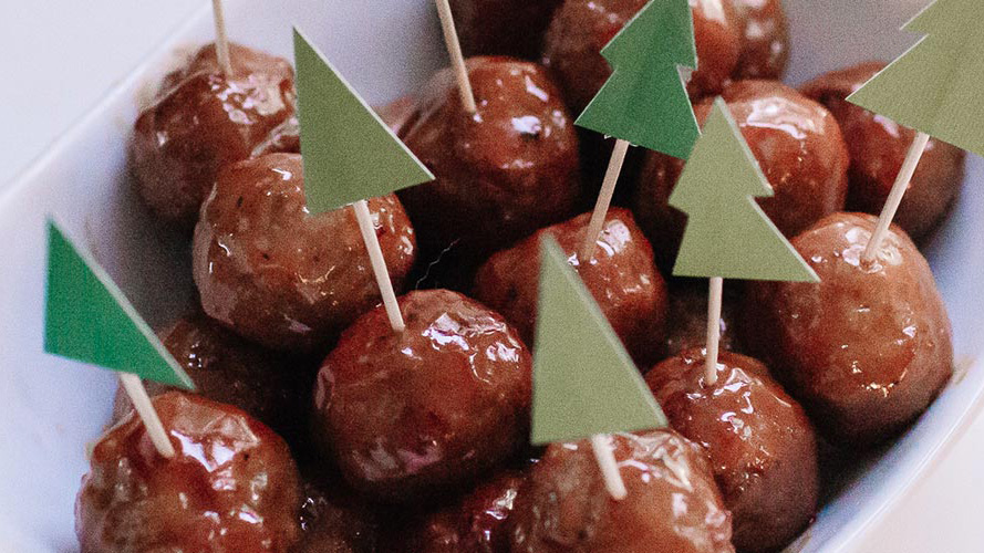 Meatballs with Dorothy Lynch Glaze that have toothpicks in them with green trees