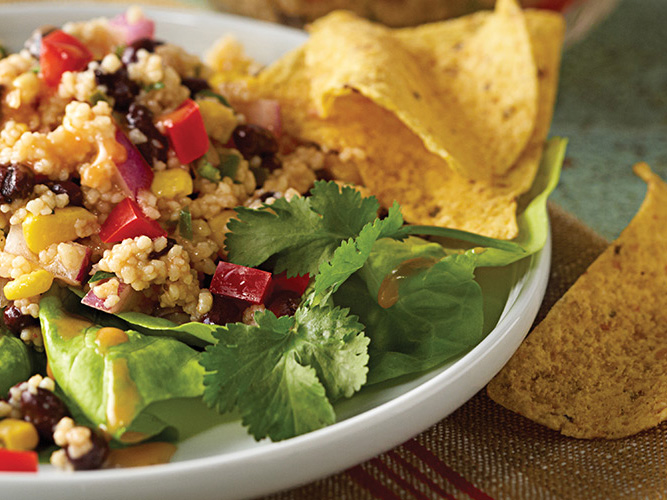 Dorothy Lynch Southwestern Coucous Recipe on white plate with chips beside