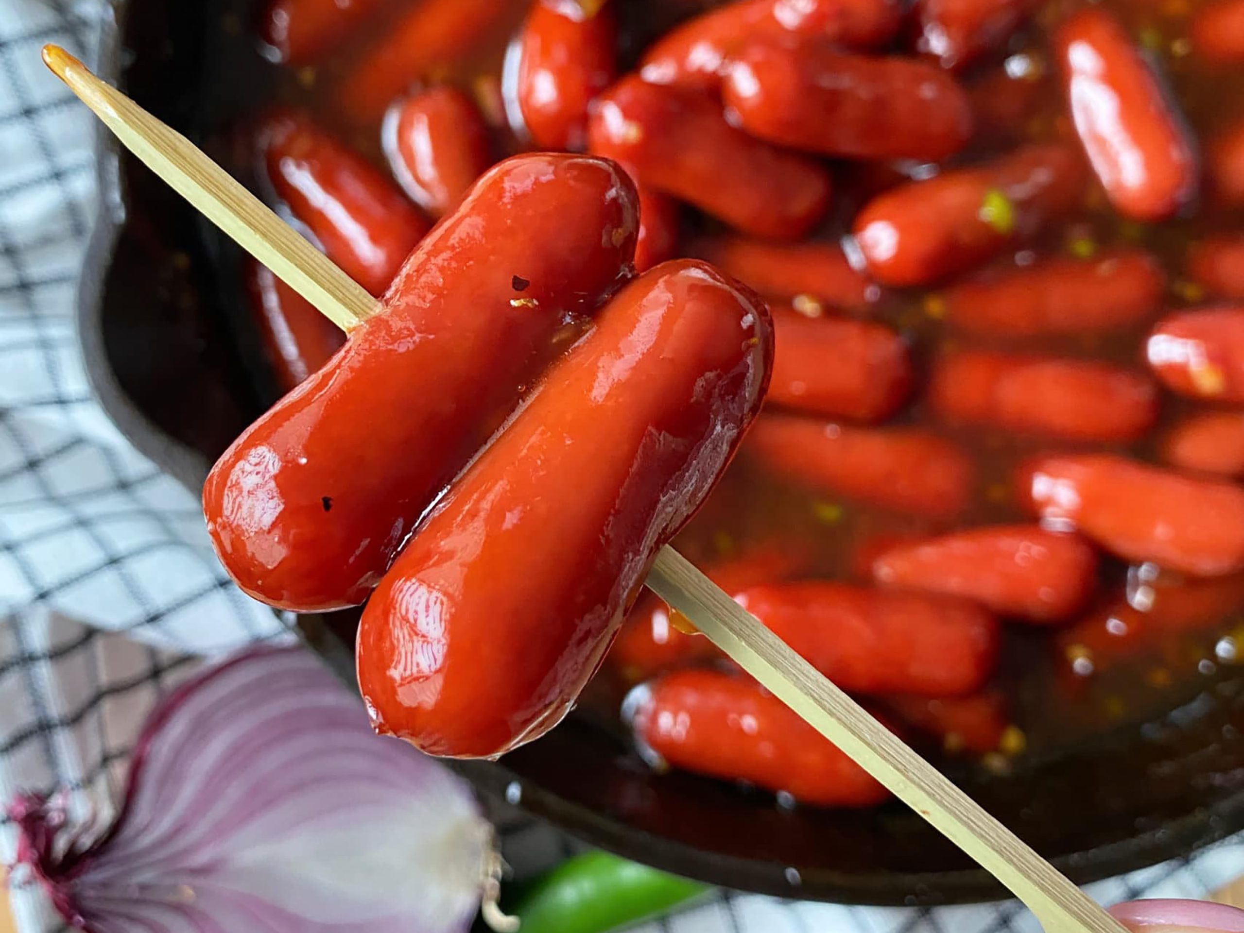 Dorothy Lynch Dressing BBQ Little Smokies on a toothpick