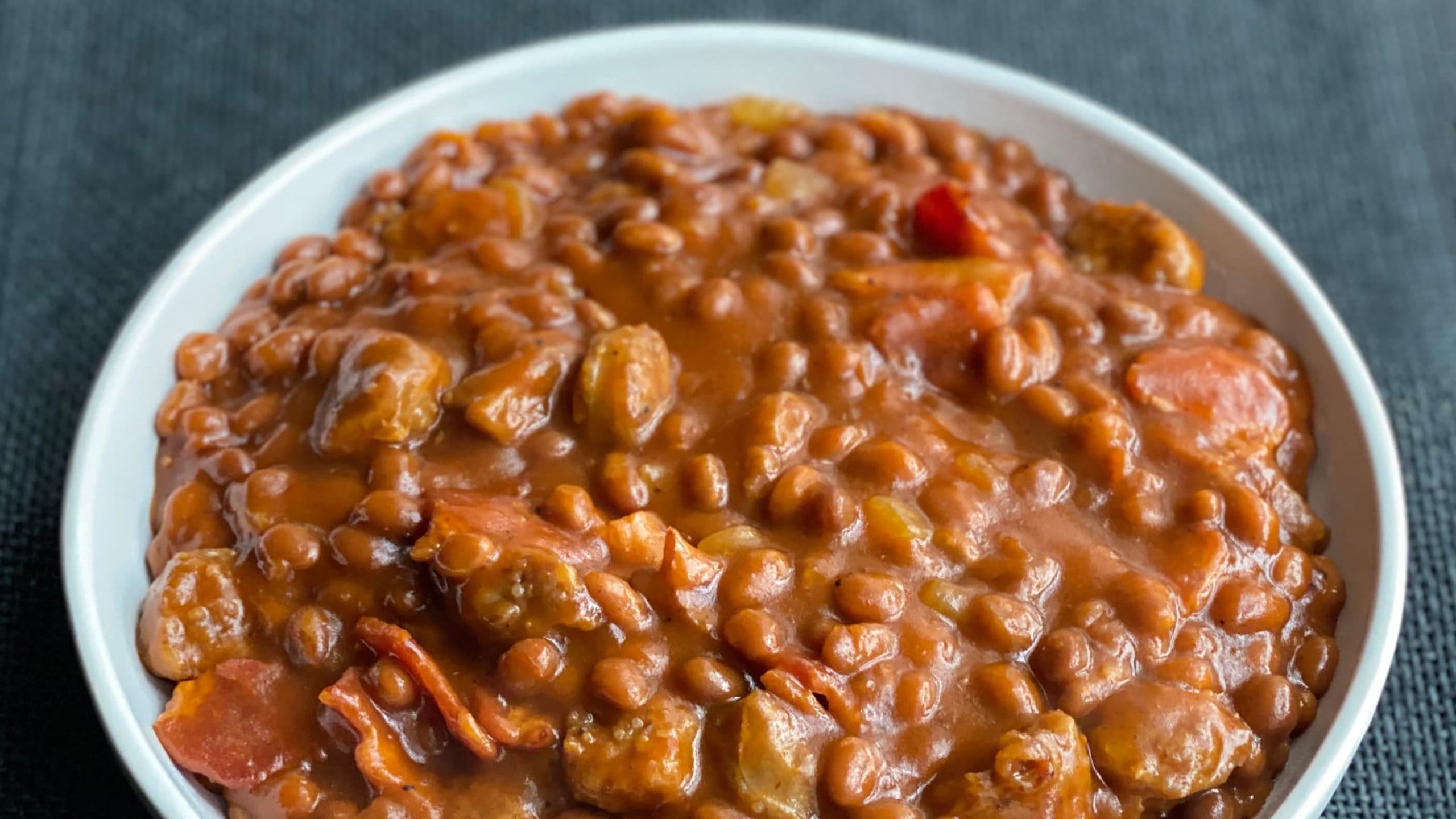 Close-up of Dorothy Lynch Dressing Meat Lover's Baked Beans in a bowl