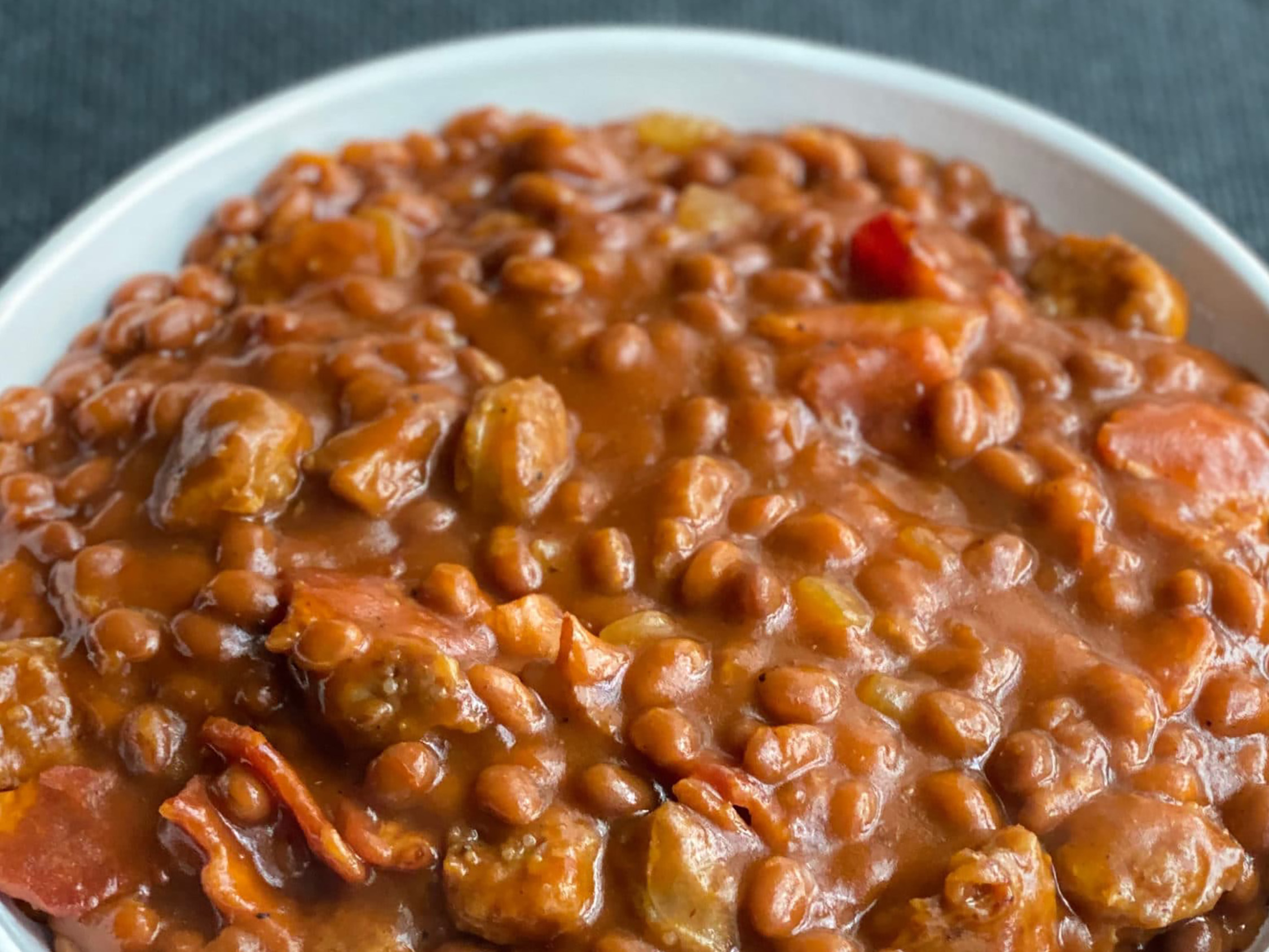 Close-up of Dorothy Lynch Dressing Meat Lover's Baked Beans in a bowl