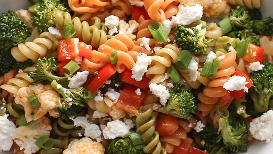 Garden Fresh Salad with Dorothy Lynch Dressing Recipe with tri colored spiral pasta, crumbly white cheese, peppers, broccoli, etc